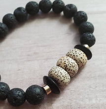 Load image into Gallery viewer, Lotus Seed | Lava Stone Bracelet
